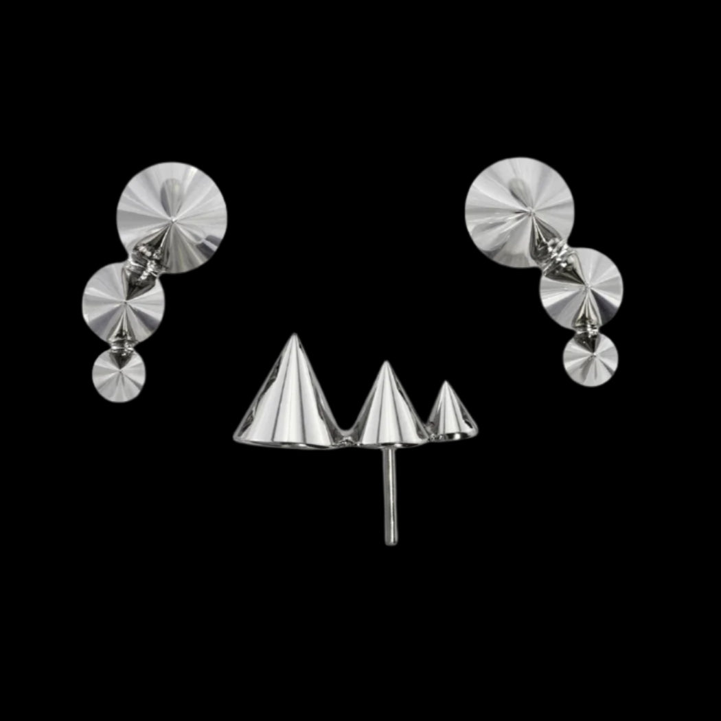 "Spiked Comet"(right) Ti.